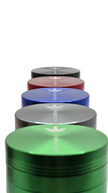 Set of colorful metal grinder tops on a white background